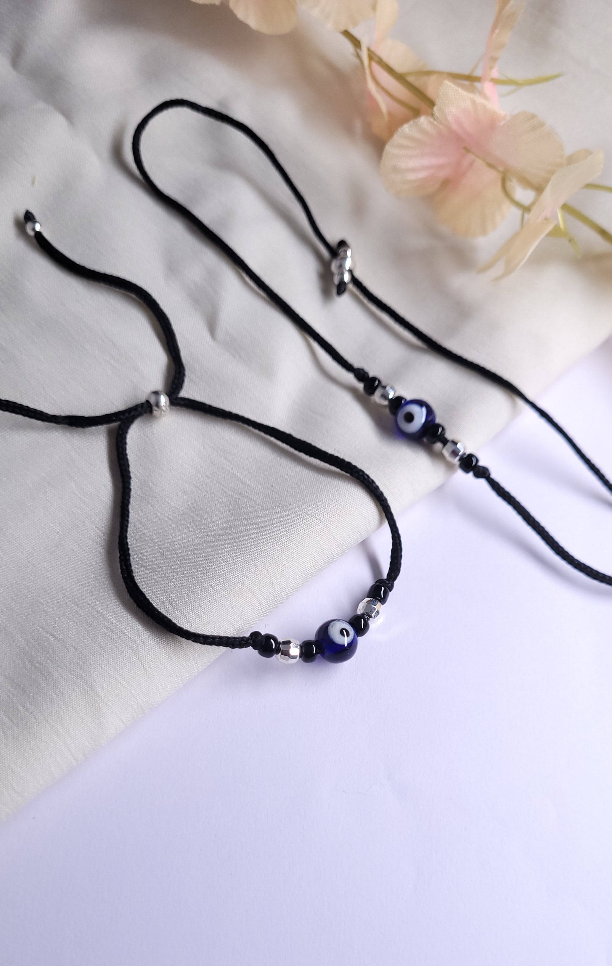 EVIL EYE BLACK THREAD ANKLET